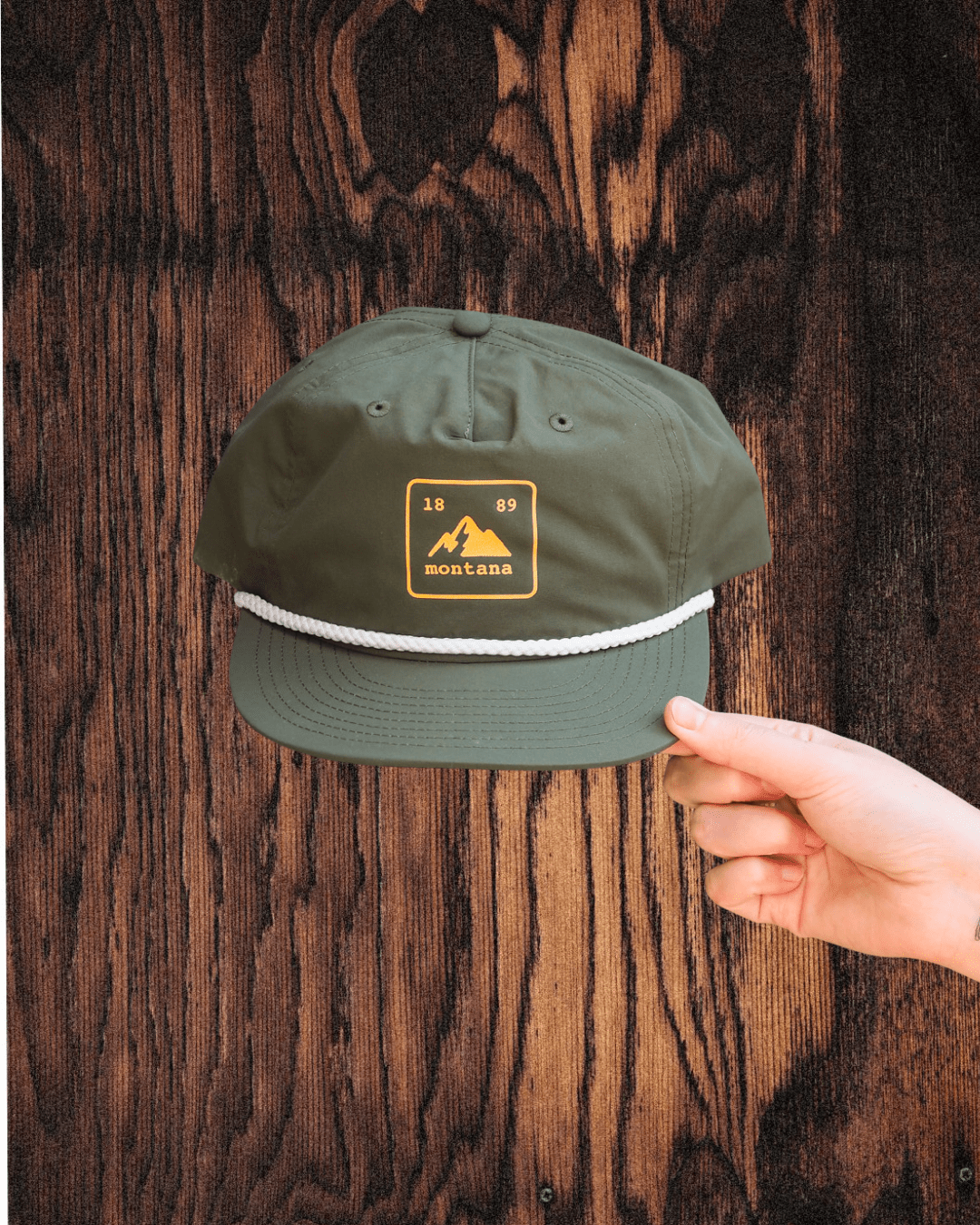 "Montana State Badge" Hat in Green - Intrigue Ink Visit Bozeman, Unique Shopping Boutique in Montana, Work from Home Clothes for Women