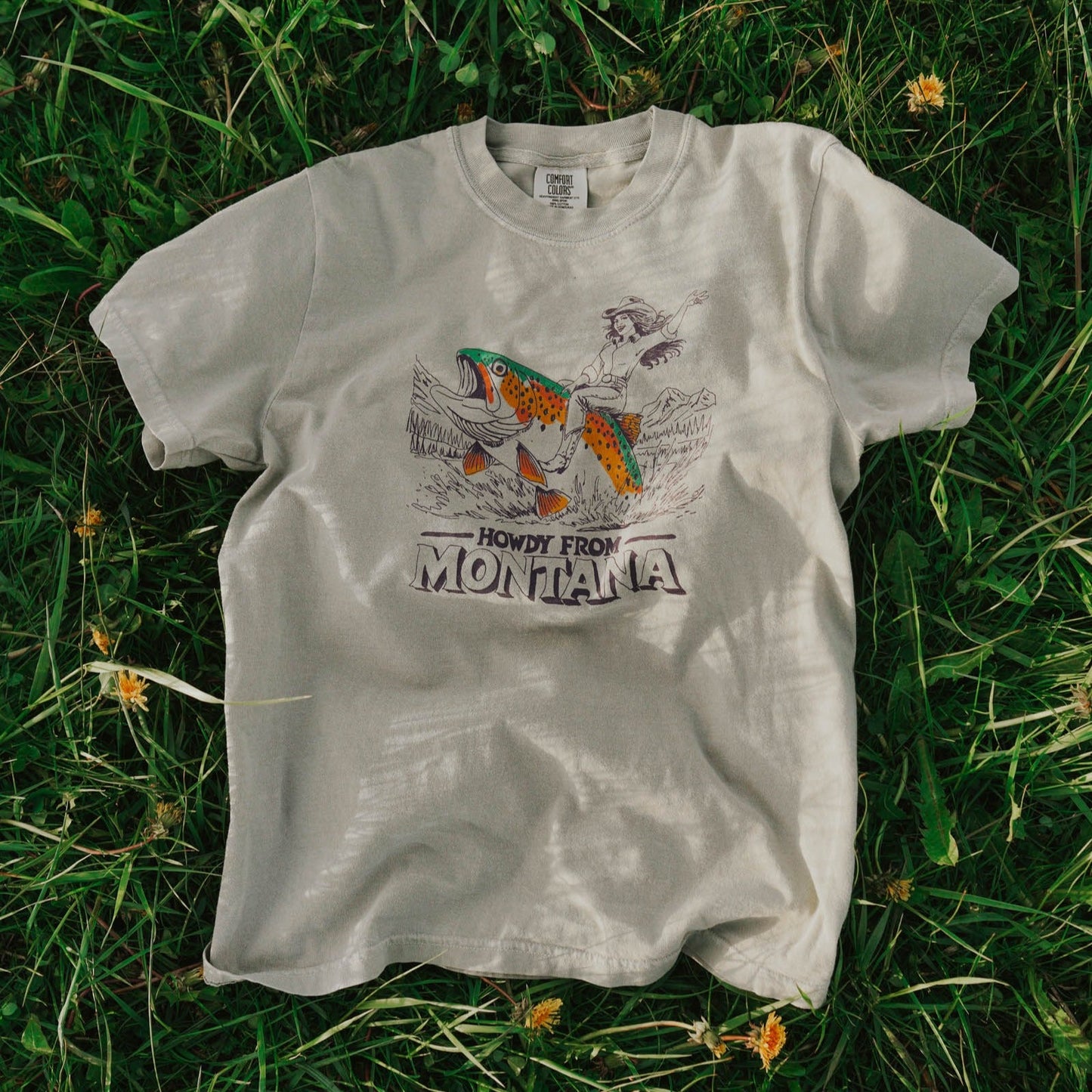 "Howdy From Montana" Tee in Sandstone - Intrigue Ink Visit Bozeman, Unique Shopping Boutique in Montana, Work from Home Clothes for Women