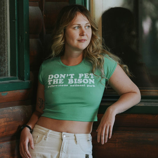 "Don't Pet the Bison" Baby Tee in Green - Intrigue Ink Visit Bozeman, Unique Shopping Boutique in Montana, Work from Home Clothes for Women