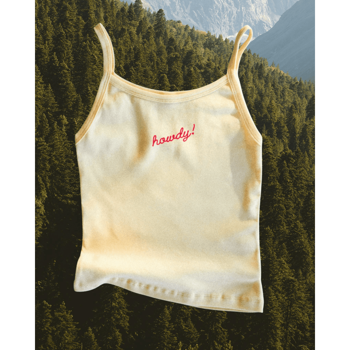 "Howdy!" Tank in Butter - Intrigue Ink Visit Bozeman, Unique Shopping Boutique in Montana, Work from Home Clothes for Women
