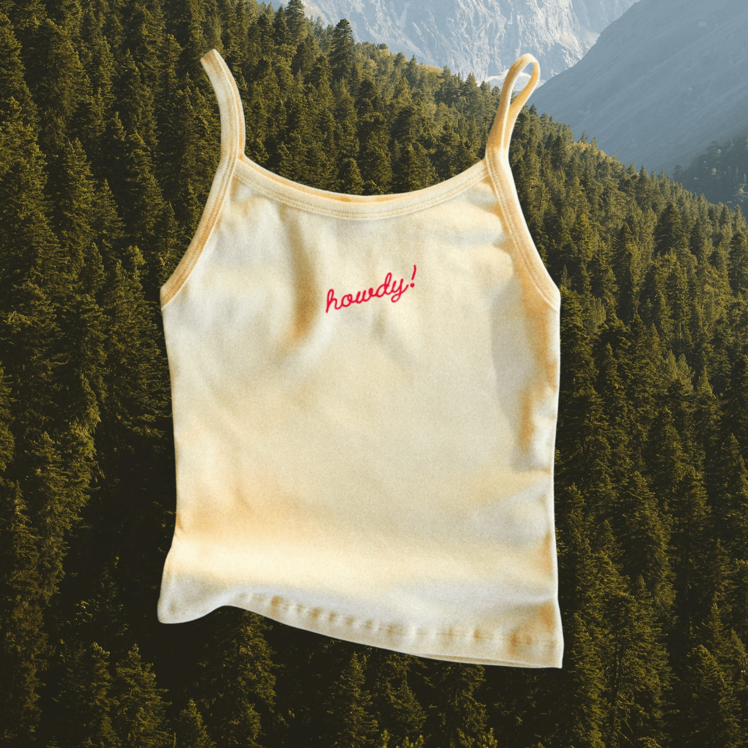 "Howdy!" Tank in Butter - Intrigue Ink Visit Bozeman, Unique Shopping Boutique in Montana, Work from Home Clothes for Women