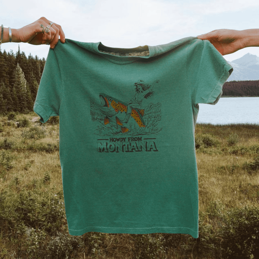 "Howdy From Montana" Tee in Green - Intrigue Ink Visit Bozeman, Unique Shopping Boutique in Montana, Work from Home Clothes for Women