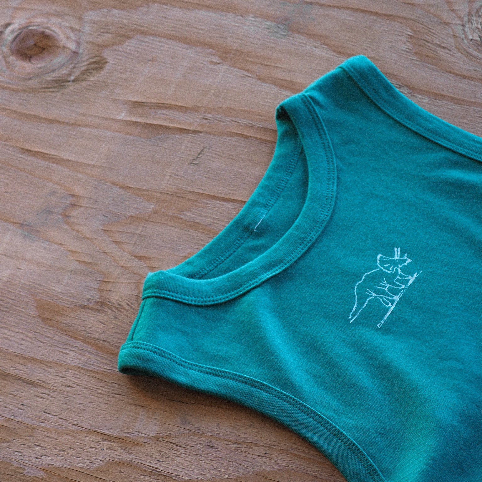 "Triceratops" Muscle Crop Tank - Intrigue Ink Visit Bozeman, Unique Shopping Boutique in Montana, Work from Home Clothes for Women