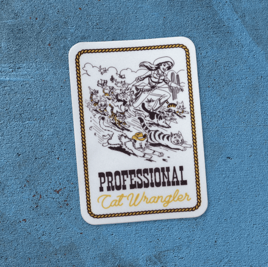 "Cat Wrangler” Sticker - Intrigue Ink Visit Bozeman, Unique Shopping Boutique in Montana, Work from Home Clothes for Women