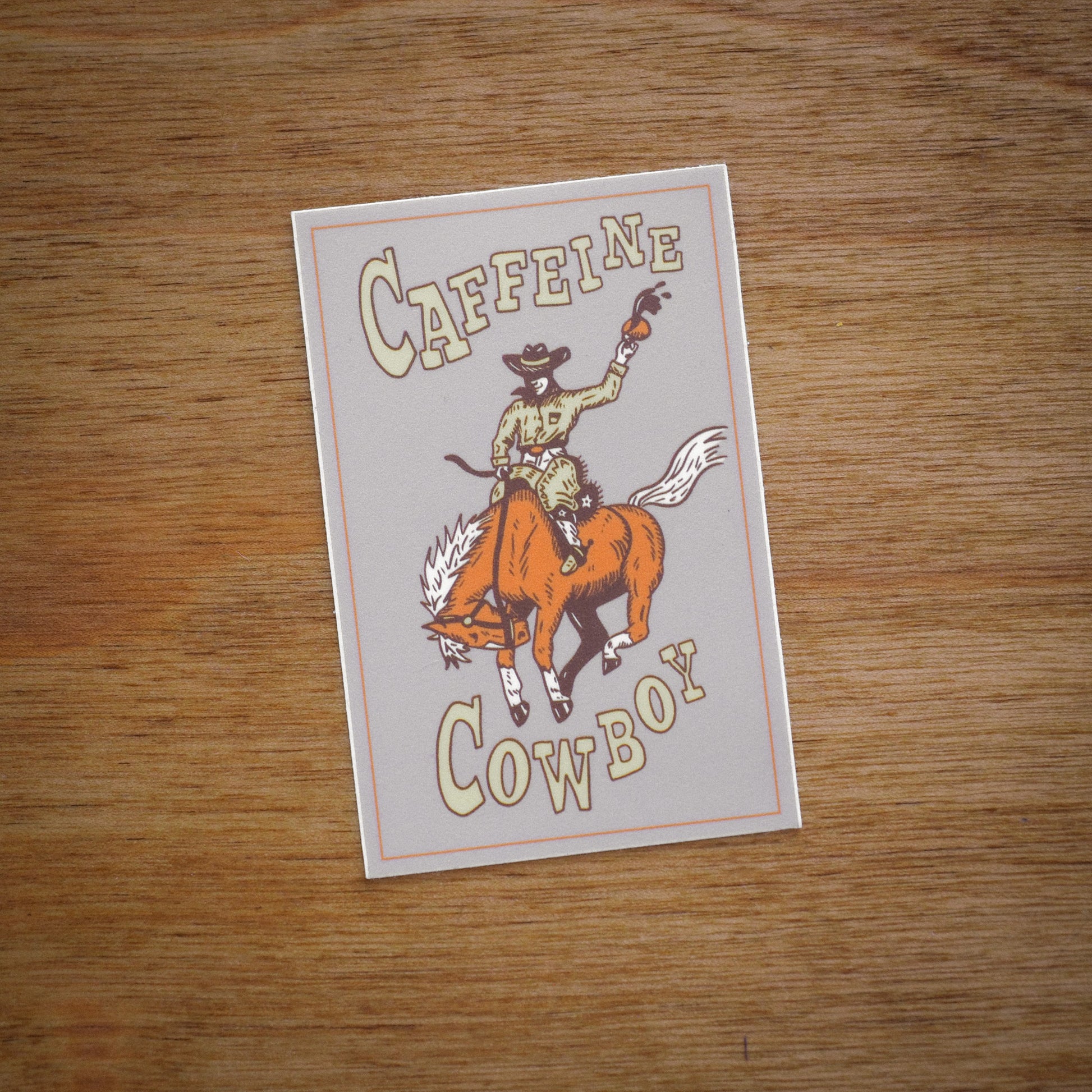 "Caffeine Cowboy" Sticker - Intrigue Ink Visit Bozeman, Unique Shopping Boutique in Montana, Work from Home Clothes for Women