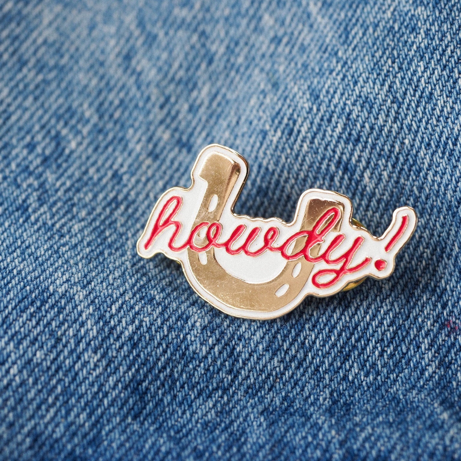 "Howdy!" Pin - Intrigue Ink Visit Bozeman, Unique Shopping Boutique in Montana, Work from Home Clothes for Women